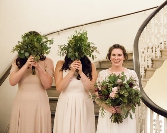 Bride with her bridal party and beautiful bouquets