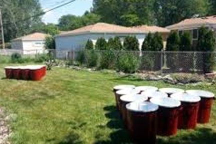 Giant beer pong at an outdoor bbq event
