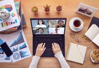 https://f.hubspotusercontent30.net/hubfs/20215080/work-from-home-people-make-video-conference-with-multi-colleague-via-picture-id1218746751-1.jpg