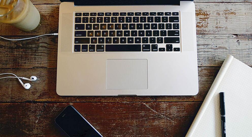 laptop-on-wooden-desk.jpg