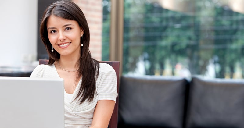 Woman at home working on a laptop computer