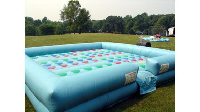 Giant inflatable twister for a birthday party, bar or bat mitzvah, or other outdoor event