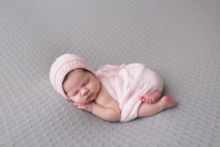 newborn baby photo in bum up pose