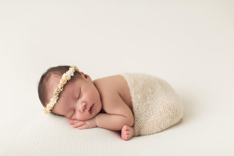 newborn baby photo in modified taco pose