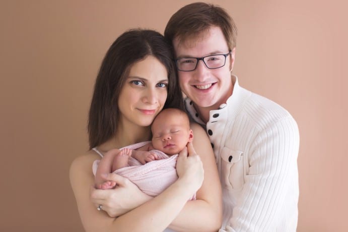 newborn baby photo pose with parents