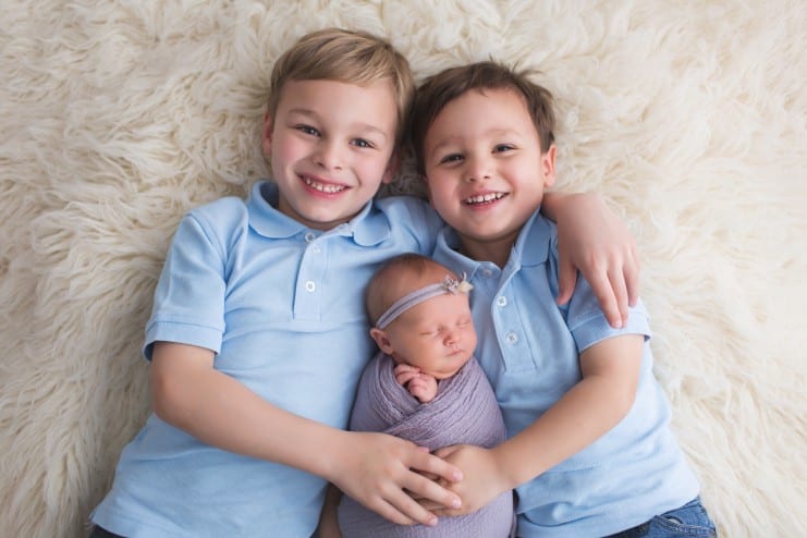 newborn boys baby photo pose with siblings