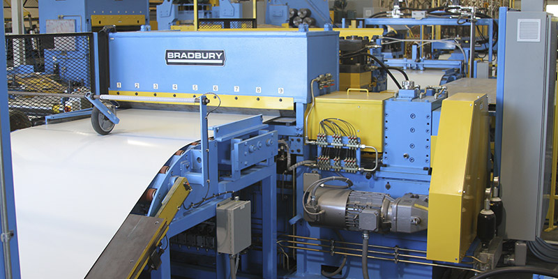 Bradbury leveler in insulated metal panel line