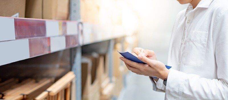 Workers in a warehouse picking and organizing products