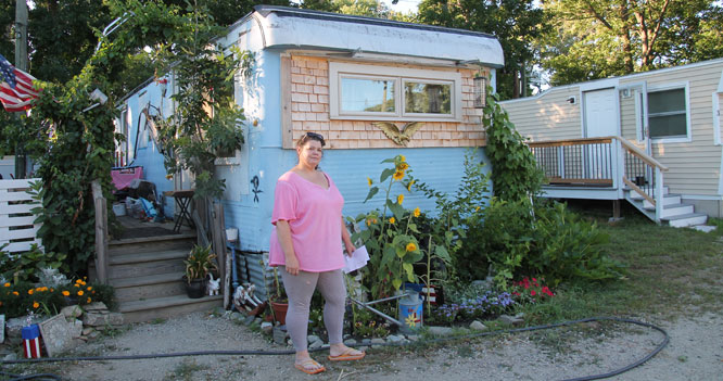 Woodbury Cooperative resident Kathy Ireland outside her home.