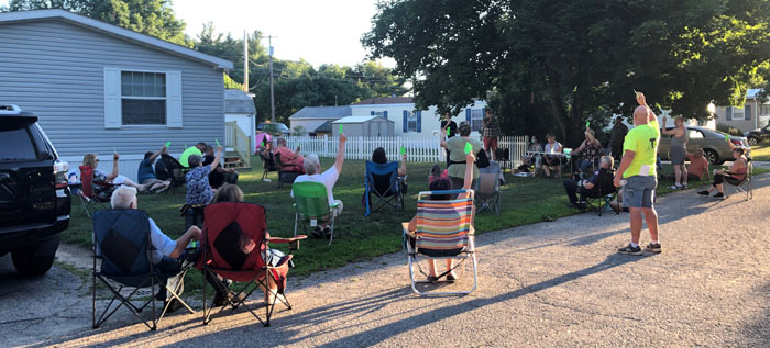Granite Estatesmembers vote during an outdoors meeting.