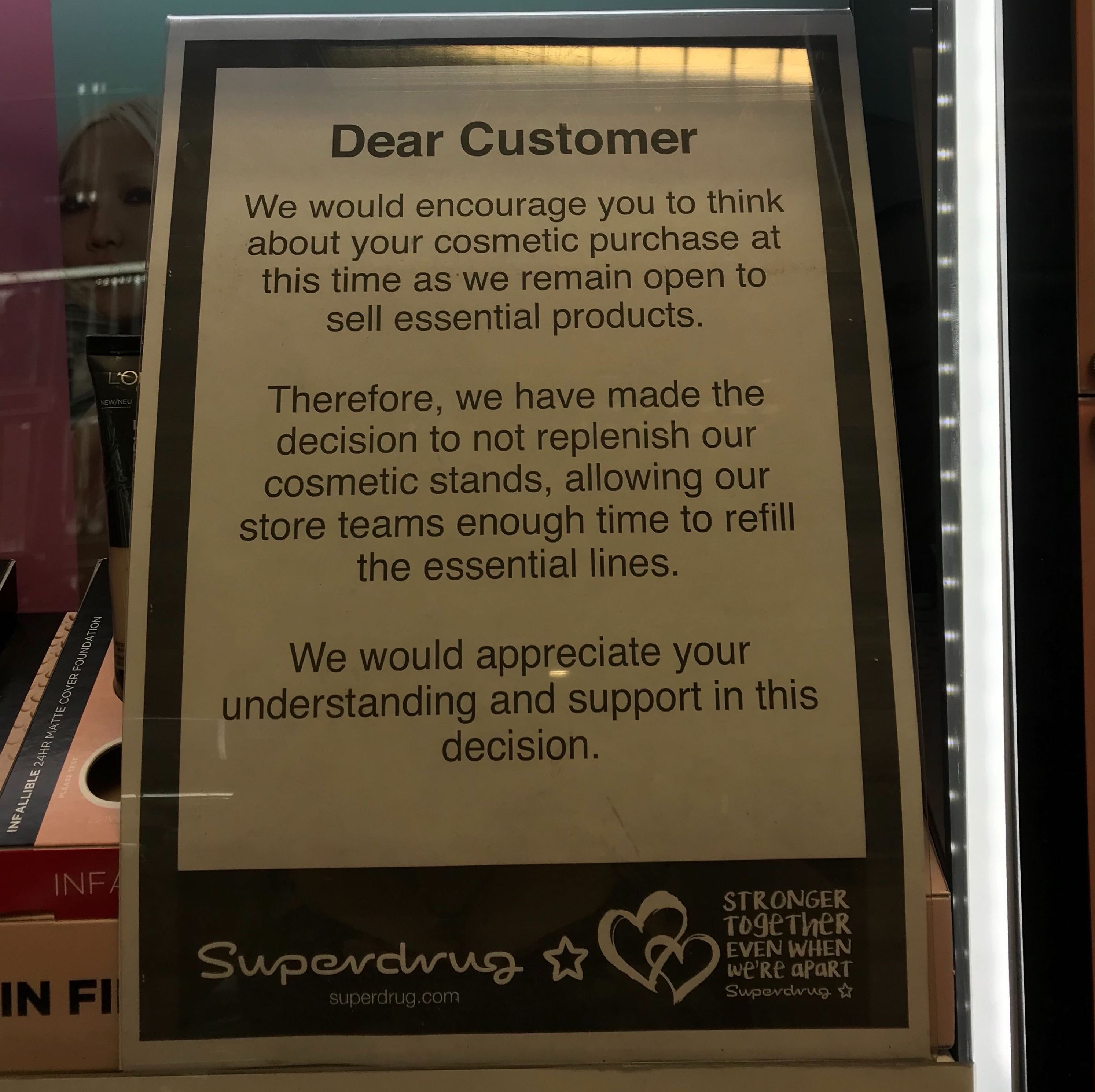 A notice in a store urging customers to think about their cosmetic purchases