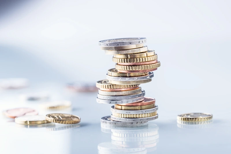 AdobeStock_139400095_Zeiterfassung_Kleingeld