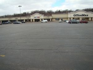 Shopping center behind a sea of parking