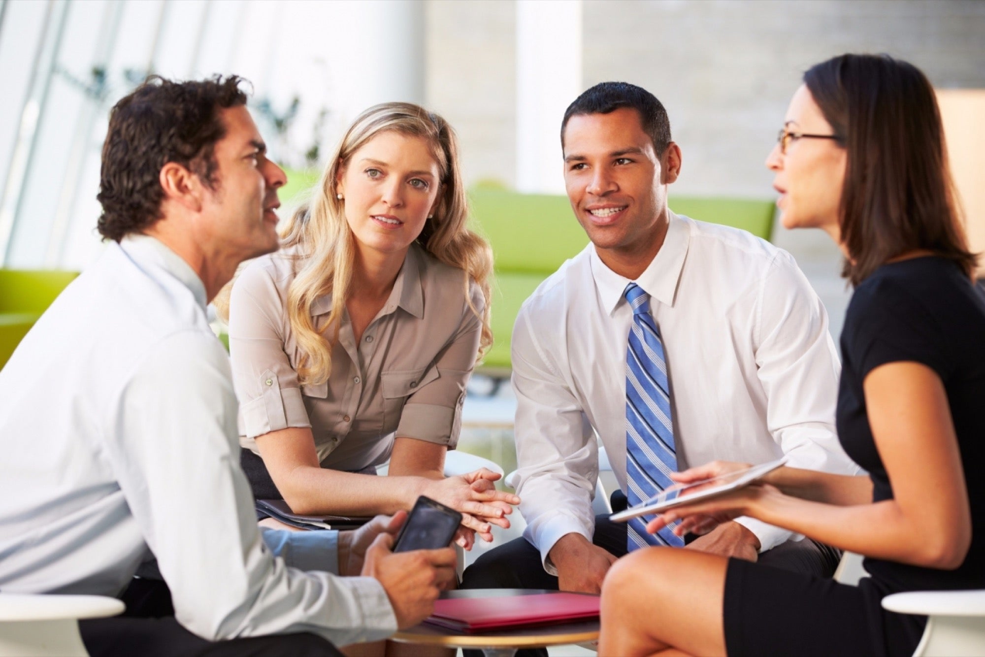 Group of four having a conversation