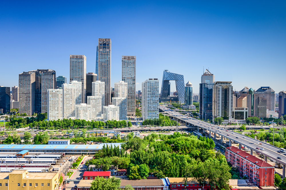 Beijing, China modern financial district skyline on a nice day with blue sky.