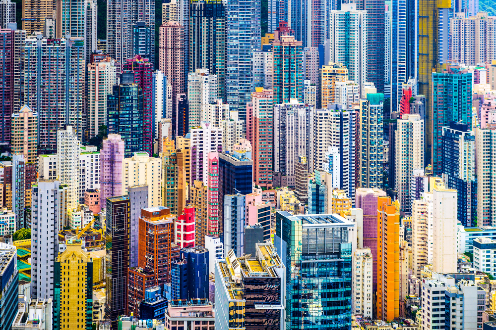 Hong Kong, China dense cityscape of office buildings.