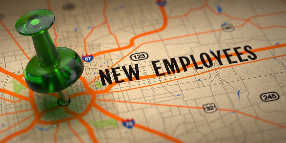 New Employees Concept - Green Pushpin on a Map Background with Selective Focus..jpeg