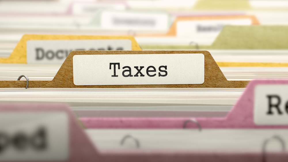 Taxes Concept on File Label in Multicolor Card Index. Closeup View. Selective Focus.