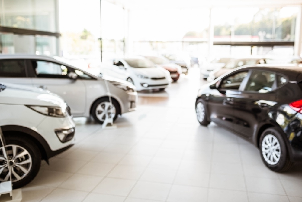 View of row new car at car dealership.jpeg